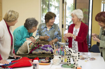 women socializing at craft group