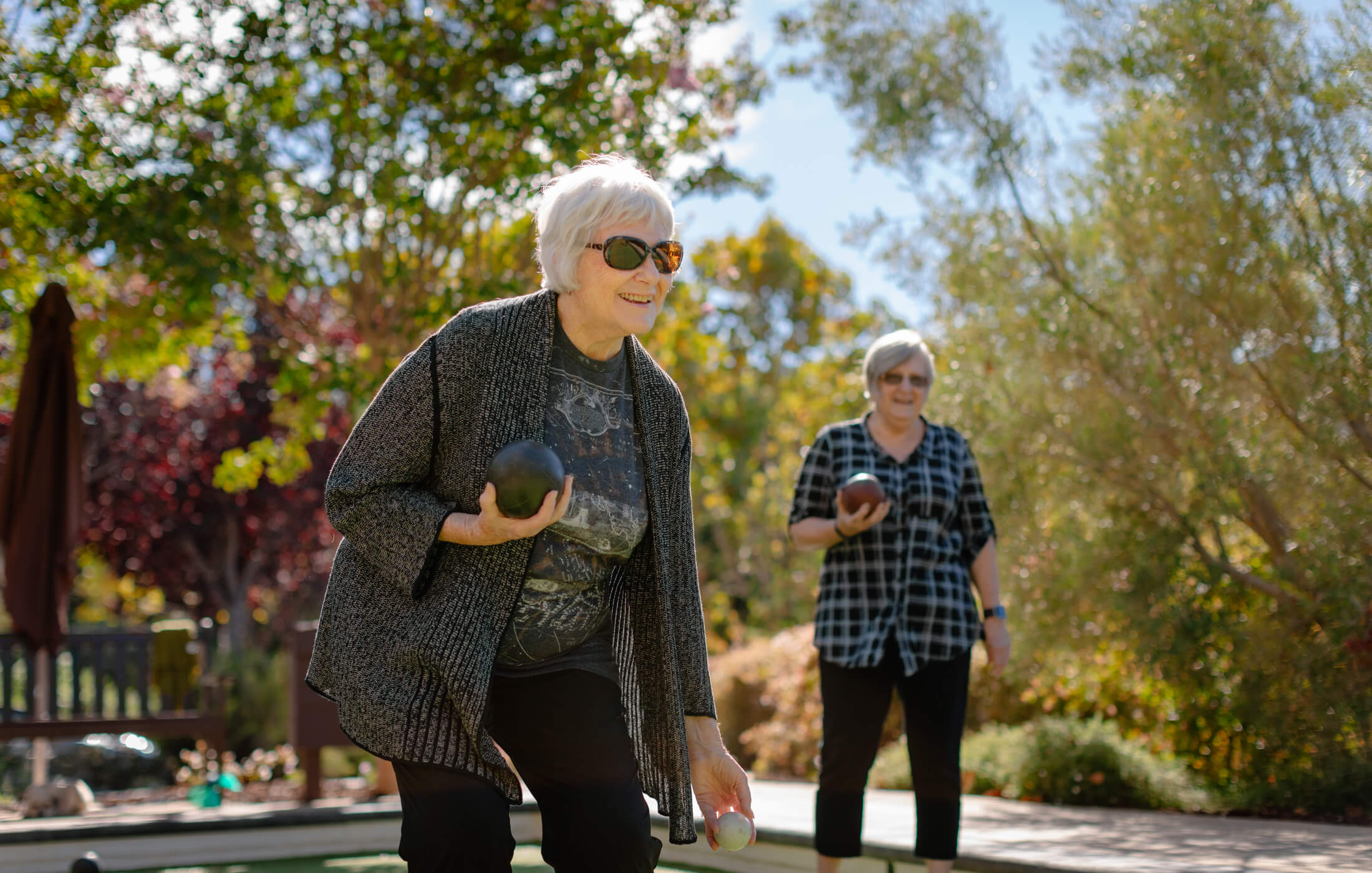 Women playing bocce ball