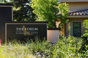 A photo of the entrance of The Forum senior living community