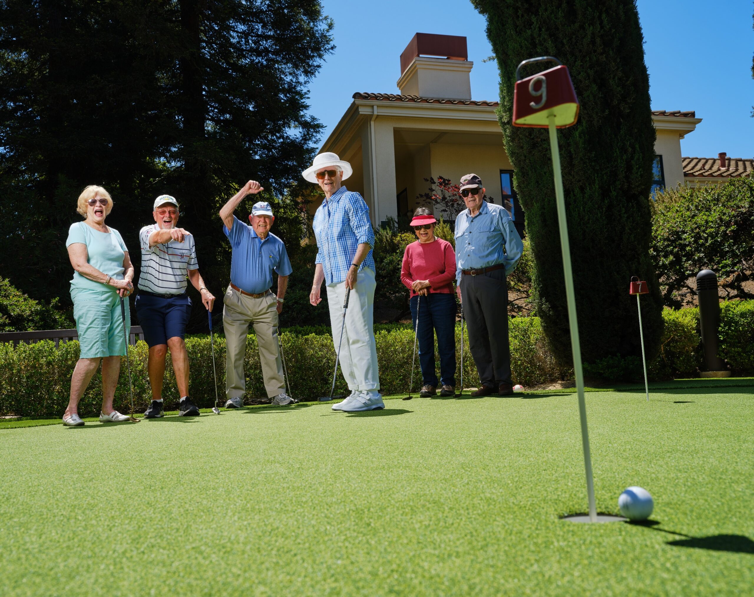 Group of seniors on the putting green